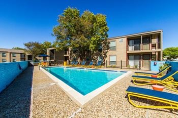 Swimming pool with relaxing sundecks